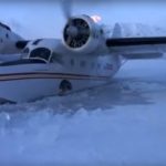 Grumman Goose seaplane in frozen water Alaska